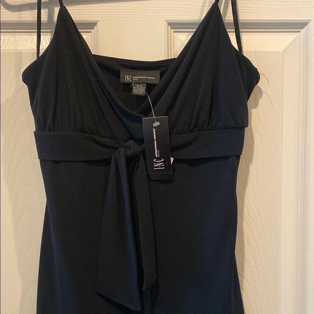 Black fitted camisole with spaghetti straps and tie front